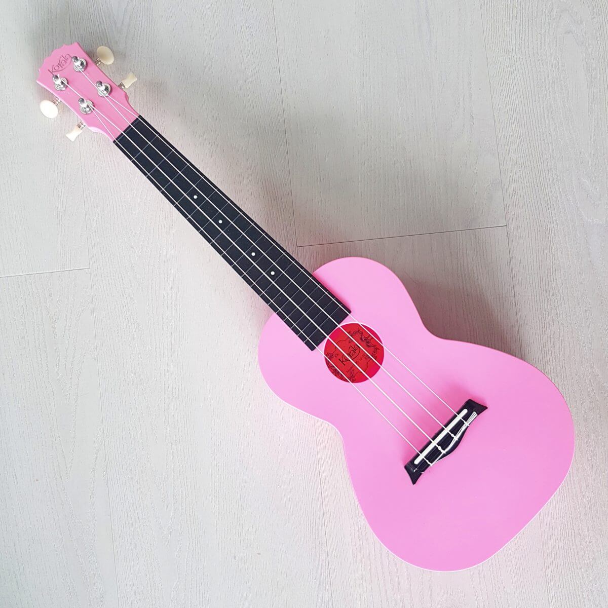 Een felgeleurde ukelele als kindergitaar