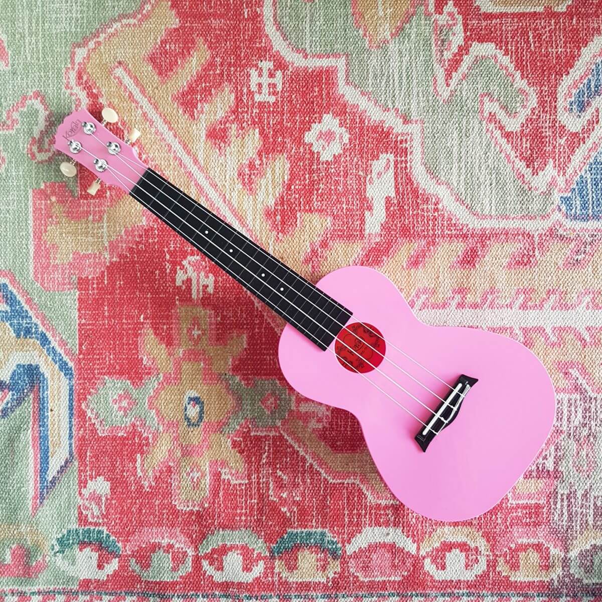 Een felgeleurde ukelele als kindergitaar