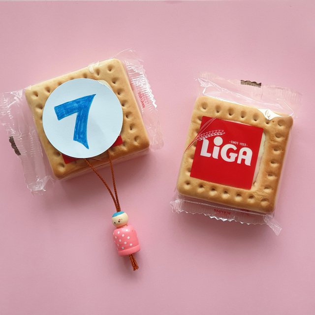 LIGA met een gelukspoppetje