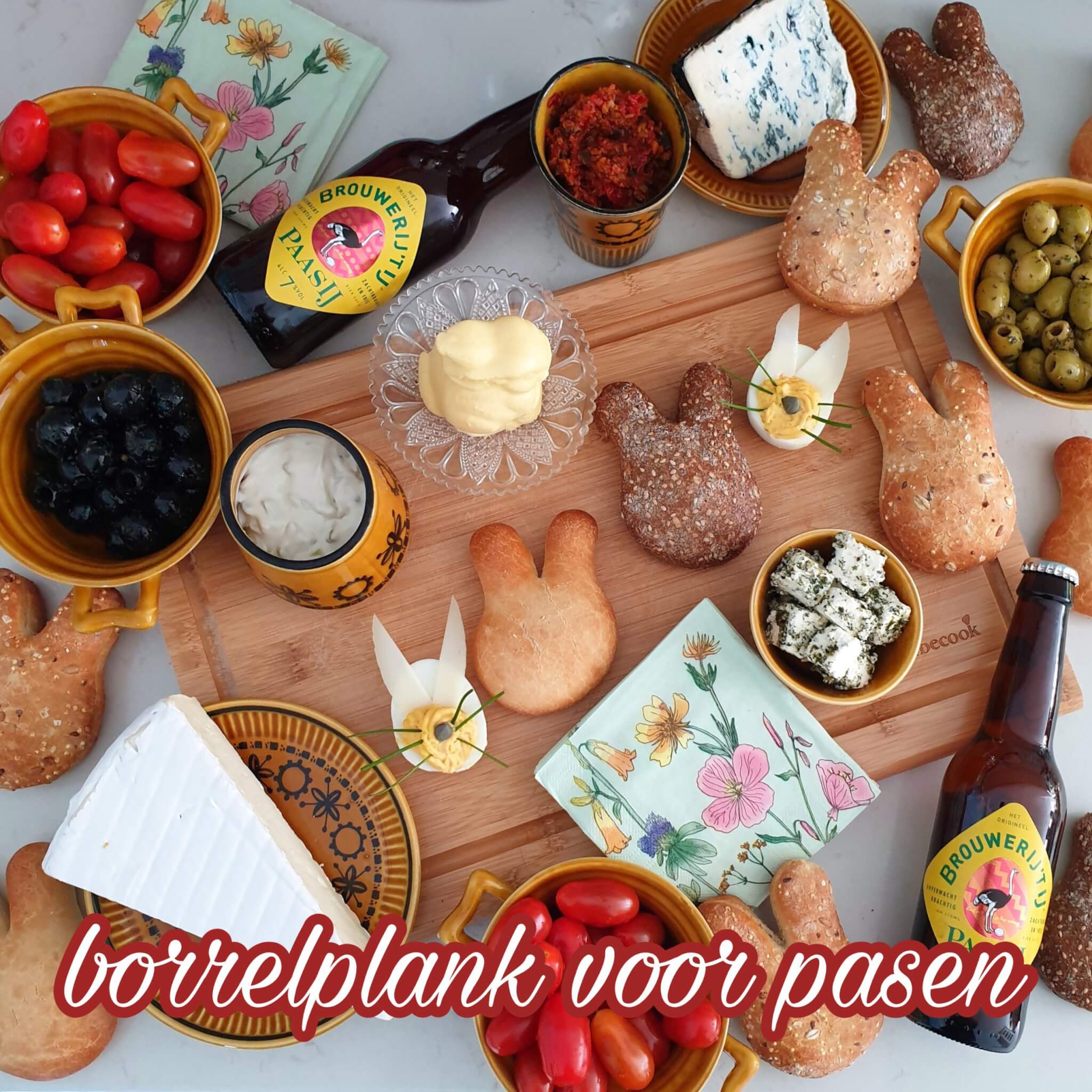 Borrelplank voor Pasen: leuke recepten voor ouders en kinderen. Bij Pasen denk je al snel aan het paasontbijt of de paasbrunch. Maar een borrelplank is ook hartstikke gezellig voor Pasen. Zo vul je een borrelplank.