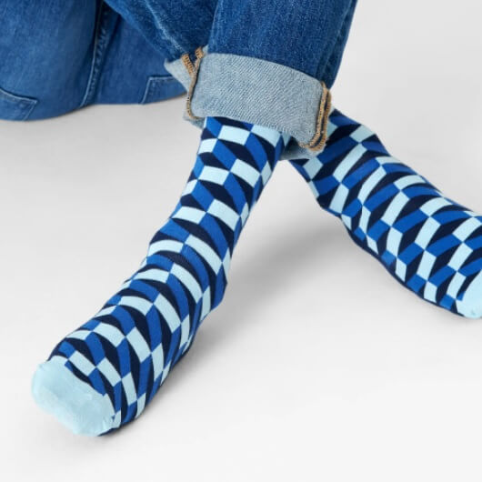 Altijd fijn: een paar vrolijke sokken. Bijvoorbeeld van Happy Socks.