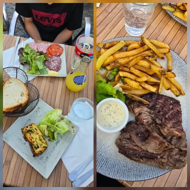 Villedieu-les-Poêles-Rouffigny staat op de lijst van villes et villages fleuris en dat is goed te zien aan de vele bloemen. In het historische centrum zitten allerlei winkels en restaurants. Wij gingen eten op het pleintje bij Le Pussoir, dat een goede eenvoudige Franse kaart heeft, met een betaalbaar drie gangen menu.